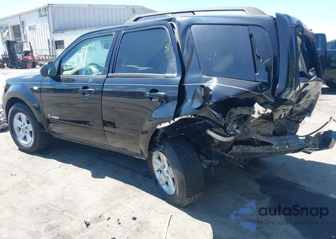 2009 Mercury Mariner Hybrid из США, поврежденный, VIN 4M2CU29359KJ17577